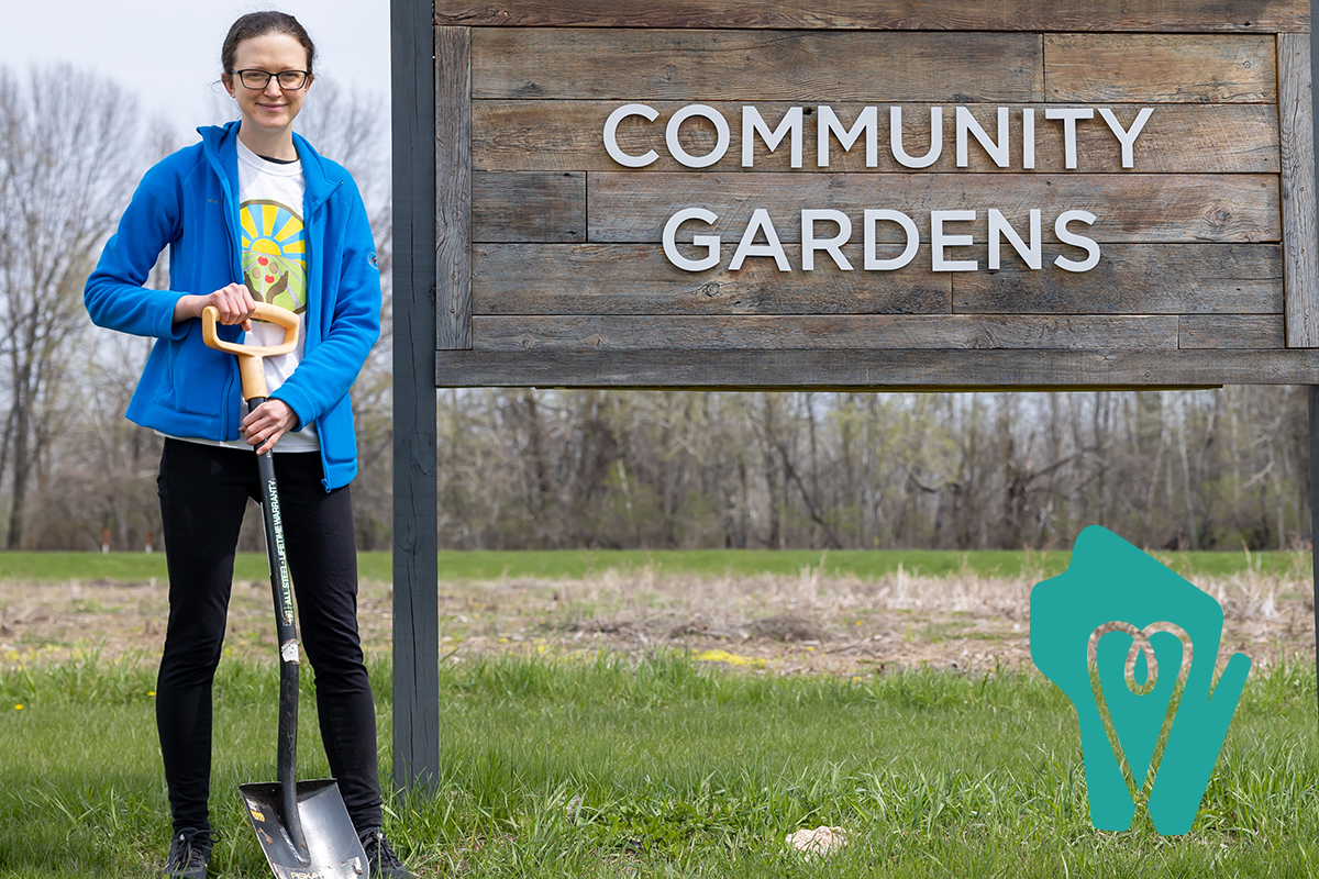Margaret with Community Garden Sign